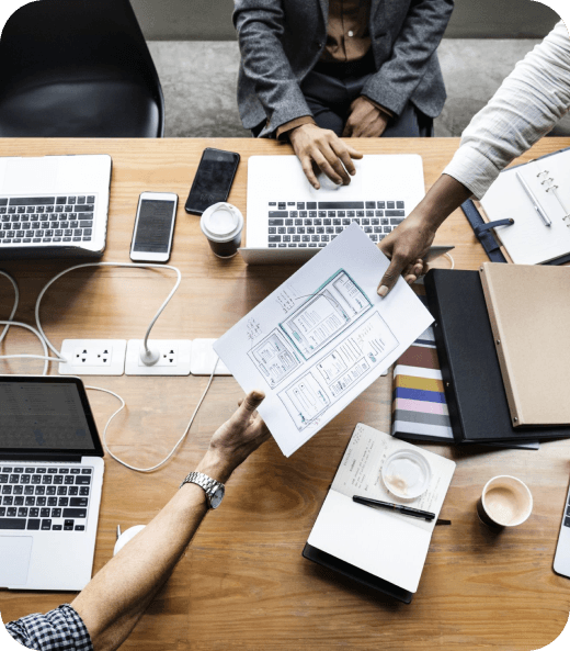 Professionals collaborating during a private banking meeting